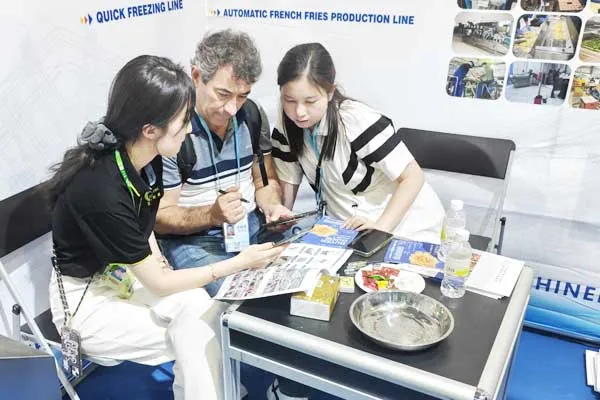 Joyshine sales team discussing vegetable washing line project with Argentina customer
